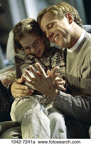 people, eyeglasses, laughing, playful, tranquility, nurturing, hugging View Large Photo Image Stock Image - people, eyeglasses, laughing, playful, tranquility, nurturing, hugging. Fotosearch