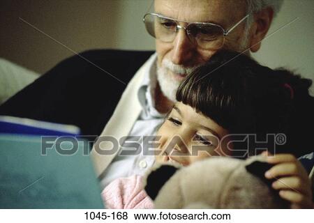 people, eyeglasses, reading, book, beard, grandfather, grandchild View Large Photo Image Stock Photo - people, eyeglasses, reading, book, beard, grandfather, grandchild. Fotosearch