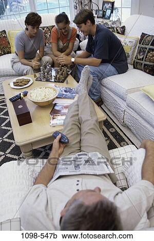 people, family, parents, indoors, Families indoors various View Large Photo Image Stock Image - people, family, parents, indoors, Families indoors various. Fotosearch