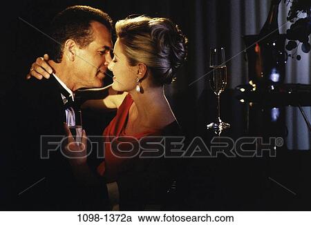 people, formal, profile, couple, champagne, dancing, holding View Large Photo Image Stock Image - people, formal, profile, couple, champagne, dancing, holding. Fotosearch