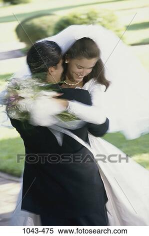 people, formal, smiling, couple, holding, outdoors, hugging View Large Photo Image Stock Photography - people, formal, smiling, couple, holding, outdoors, hugging. Fotosearch
