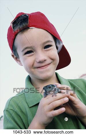 people, frog, smiling, hat, pet, boy, outdoors View Large Photo Image Stock Image - people, frog, smiling, hat, pet, boy, outdoors. Fotosearch