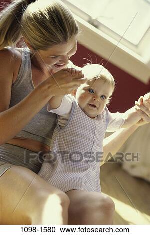 people, hands, playing, sitting, mother, baby, floor View Large Photo Image Stock Image - people, hands, playing, sitting, mother, baby, floor. Fotosearch