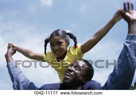 people, hands, sitting, riding, holding, outdoors, carrying View Large Photo Image Stock Photo - people, hands, sitting, riding, holding, outdoors, carrying. Fotosearch