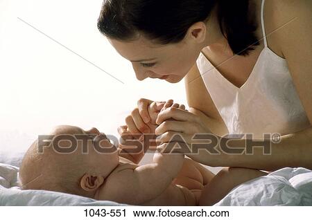 people, hands, smiling, mother, baby, holding View Large Photo Image Stock Image - people, hands, smiling, mother, baby, holding. Fotosearch