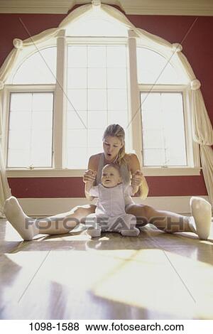 people, hands, windows, playing, sitting, mother, baby View Large Photo Image Stock Photo - people, hands, windows, playing, sitting, mother, baby. Fotosearch