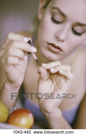 people, hands, woman, painting, concentrating, fingernails, blond View Large Photo Image Stock Image - people, hands, woman, painting, concentrating, fingernails, blond. Fotosearch
