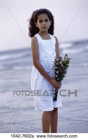 people, Hispanic, beach, girl, flowers, outdoors, individuality View Large Photo Image Stock Image - people, Hispanic, beach, girl, flowers, outdoors, individuality. Fotosearch