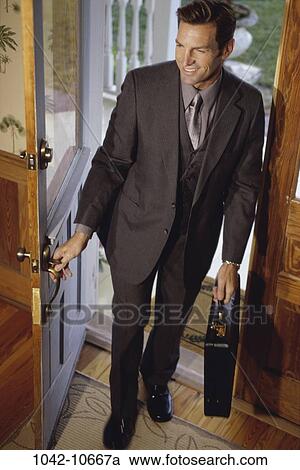 people, home, briefcase, door, open, business View Large Photo Image Stock Image - people, home, briefcase, door, open, business. Fotosearch