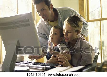 people, home, computer, family, learning, indoors View Large Photo Image Picture - people, home, computer, family, learning, indoors. Fotosearch