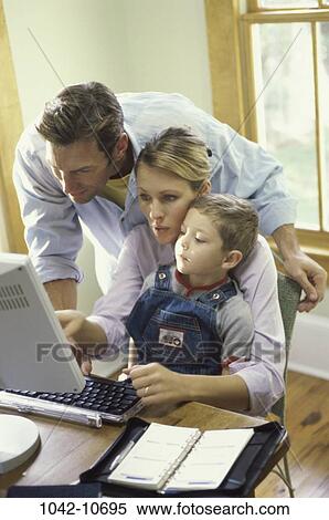 people, home, computer, family, learning, indoors View Large Photo Image Stock Photography - people, home, computer, family, learning, indoors. Fotosearch