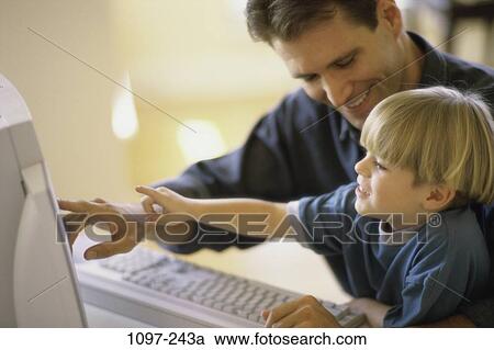 people, home, smiling, technology, computer, pointing View Large Photo Image Stock Image - people, home, smiling, technology, computer, pointing. Fotosearch