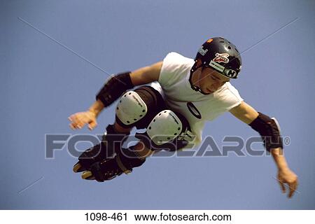 people, jump, jumping, male, helmet, outdoors View Large Photo Image Stock Image - people, jump, jumping, male, helmet, outdoors. Fotosearch