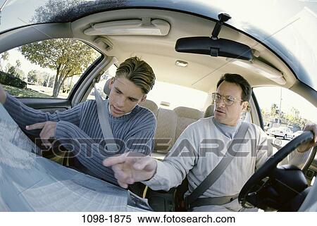 people, lost, map, car, driving, pointing View Large Photo Image Stock Photography - people, lost, map, car, driving, pointing. Fotosearch