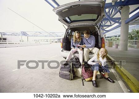 Stock Image - people, luggage, outdoors, vacations, outings, family, blond. Fotosearch