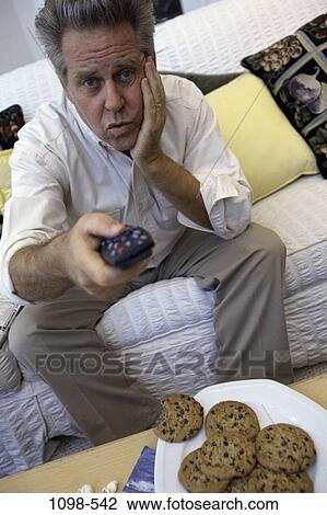 people, male, senior, entertainment, television, brunette View Large Photo Image Stock Image - people, male, senior, entertainment, television, brunette. Fotosearch