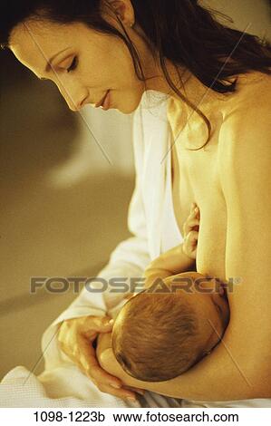 Stock Image - people, mother, baby, family, parent, indoors, Mother baby indoors. Fotosearch