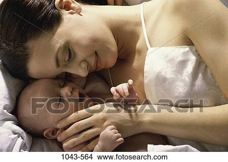 people, mother, baby, family, affection, touching View Large Photo Image Picture - people, mother, baby, family, affection, touching. Fotosearch