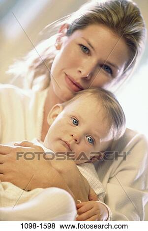 people, mother, baby, holding, family, affection, content View Large Photo Image Stock Photo - people, mother, baby, holding, family, affection, content. Fotosearch