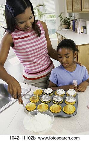 people, mother, frost, family, food, kitchen, daughter View Large Photo Image Stock Image - people, mother, frost, family, food, kitchen, daughter. Fotosearch