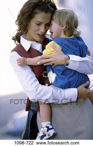 people, mother, Hispanic, crying, toddler, attache case, outdoors View Large Photo Image Stock Image - people, mother, Hispanic, crying, toddler, attache case, outdoors. Fotosearch