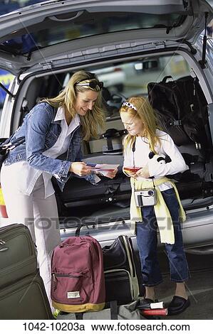 people, mother, luggage, outdoors, outings, family, vacation View Large Photo Image Stock Image - people, mother, luggage, outdoors, outings, family, vacation. Fotosearch