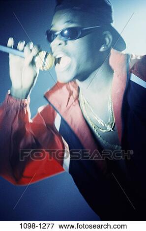 people, music, sunglasses, entertainment, singing View Large Photo Image Stock Photo - people, music, sunglasses, entertainment, singing. Fotosearch