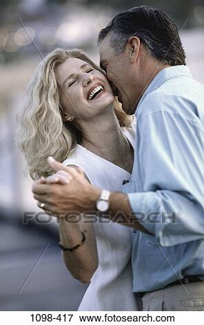 people, neck, couple, laughing, dancing, dance, outdoors View Large Photo Image Stock Photo - people, neck, couple, laughing, dancing, dance, outdoors. Fotosearch