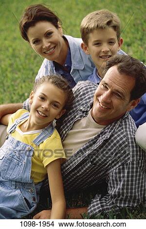 people, outdoors, family, leisure, bonding, casual, parents View Large Photo Image Picture - people, outdoors, family, leisure, bonding, casual, parents. Fotosearch