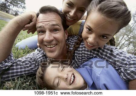 Stock Image - people, outdoors, family, parents, Families outdoors various. Fotosearch