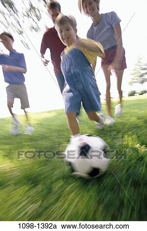 people, playing, ball, motion, outdoors, family, play View Large Photo Image Stock Image - people, playing, ball, motion, outdoors, family, play. Fotosearch