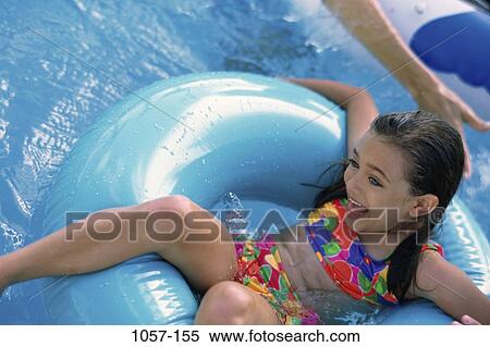 people, pool, Hispanic, girl, summer, outdoors, ring View Large Photo Image Stock Photography - people, pool, Hispanic, girl, summer, outdoors, ring. Fotosearch
