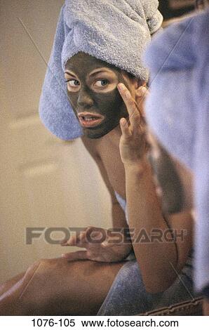 people, reflection, woman, mask, mirror, reflecting, towel View Large Photo Image Stock Photography - people, reflection, woman, mask, mirror, reflecting, towel. Fotosearch