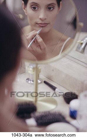 people, reflection, woman, concentration, concentrating, mirror, makeup View Large Photo Image Stock Image - people, reflection, woman, concentration, concentrating, mirror, makeup. Fotosearch