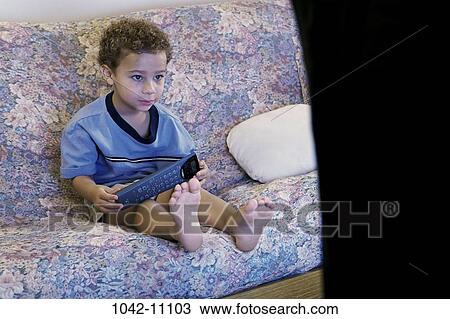 people, sitting, watch, couch, boy, entertainment, watching View Large Photo Image Stock Image - people, sitting, watch, couch, boy, entertainment, watching. Fotosearch