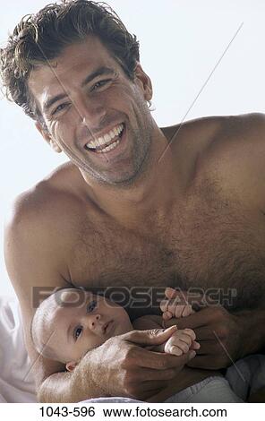 people, smiling, baby, happy, holding, smile, family View Large Photo Image Stock Photograph - people, smiling, baby, happy, holding, smile, family. Fotosearch