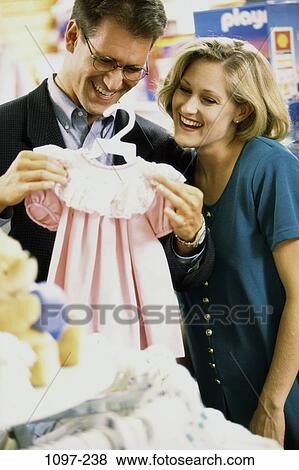 people, smiling, couple, eyeglasses, choices, pleased, future View Large Photo Image Stock Photo - people, smiling, couple, eyeglasses, choices, pleased, future. Fotosearch