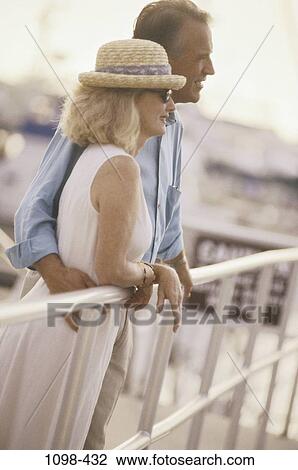 people, smiling, couple, happy, outdoors, Middle-aged, friends View Large Photo Image Stock Image - people, smiling, couple, happy, outdoors, Middle-aged, friends. Fotosearch