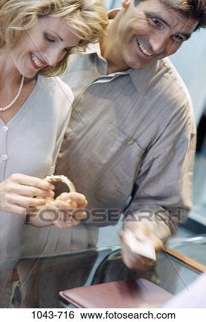 people, smiling, couple, pearl, bracelet, jewelry, necklace View Large Photo Image Stock Photograph - people, smiling, couple, pearl, bracelet, jewelry, necklace. Fotosearch