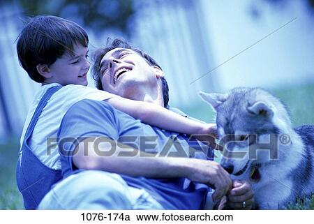 people, smiling, dog, animals, pet, laughing, outdoors View Large Photo Image Stock Image - people, smiling, dog, animals, pet, laughing, outdoors. Fotosearch
