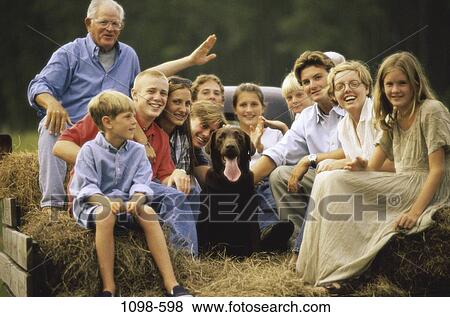 people, smiling, dog, eyeglasses, mother, pet View Large Photo Image Stock Photo - people, smiling, dog, eyeglasses, mother, pet. Fotosearch