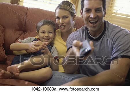 people, smiling, excited, sitting, watch, happy View Large Photo Image Stock Image - people, smiling, excited, sitting, watch, happy. Fotosearch