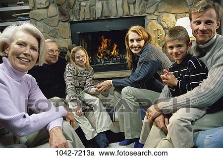people, smiling, fireplace, smile, unity, family, generations View Large Photo Image Stock Image - people, smiling, fireplace, smile, unity, family, generations. Fotosearch