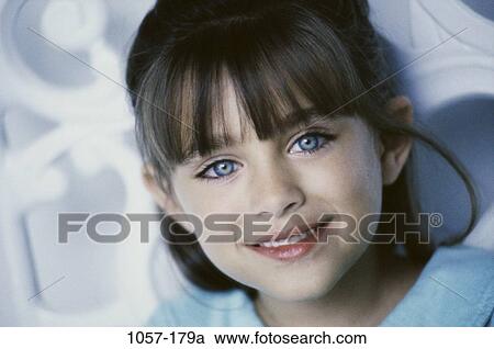 Stock Image - people, smiling, girl, smile, child, posing. Fotosearch