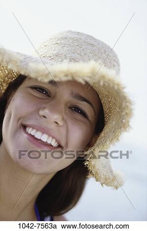 people, smiling, hat, outdoors, smile, posing, brunette View Large Photo Image Stock Image - people, smiling, hat, outdoors, smile, posing, brunette. Fotosearch