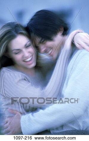 people, smiling, laughing, motion, couples outdoors, hugging, energetic View Large Photo Image Stock Photograph - people, smiling, laughing, motion, couples outdoors, hugging, energetic. Fotosearch