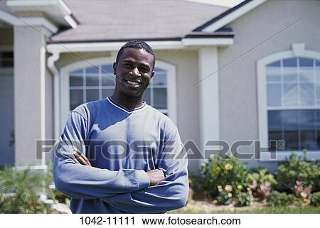 people, smiling, lawn, building, standing, outdoors View Large Photo Image Stock Image - people, smiling, lawn, building, standing, outdoors. Fotosearch