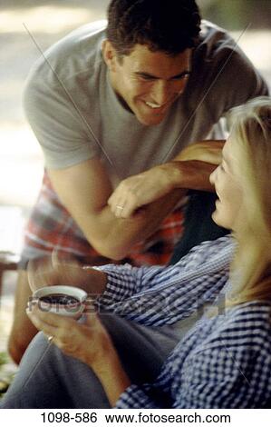 people, smiling, morning, talking, couple, coffee, coffee cup View Large Photo Image Stock Photograph - people, smiling, morning, talking, couple, coffee, coffee cup. Fotosearch