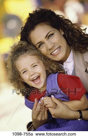 people, smiling, mother, laughing, outdoors, hugging, smile View Large Photo Image Stock Image - people, smiling, mother, laughing, outdoors, hugging, smile. Fotosearch