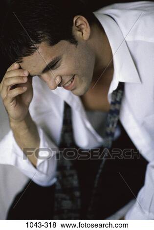 Stock Photo - people, smiling, shirt, Hispanic, contemplation, smile. Fotosearch
